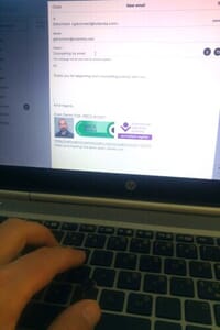 Image of a thoughtful reply being composed as part of email counselling work.